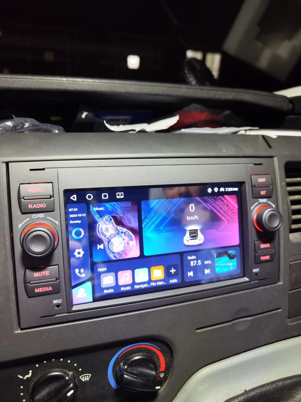 Android multimedia head unit installed in a vehicle