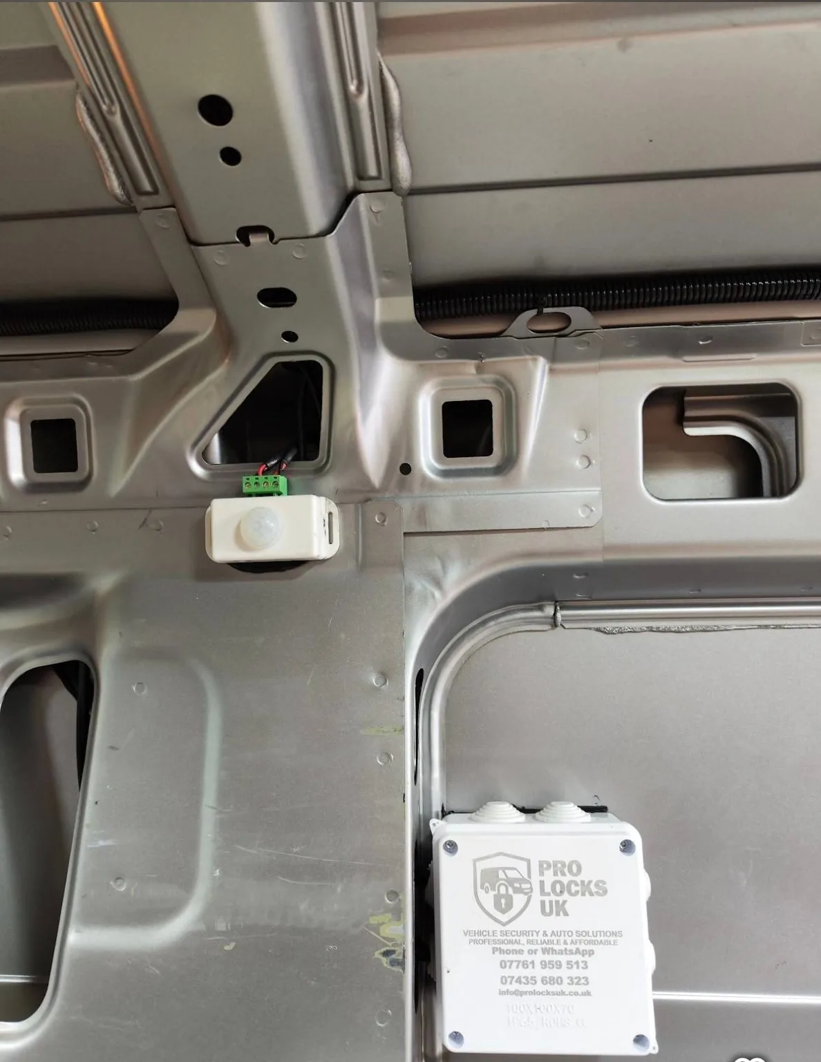 PIR sensor and control enclosure for automatic van interior lighting