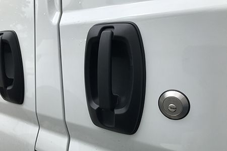 Slam lock installation for a commercial van